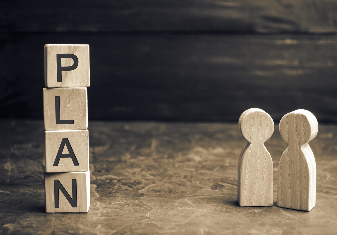 Two businessmen are discussing the plan of expenses and finances. Financial investments and goal putting a plan into action. Saving and accumulation money to make your dreams. Business planning